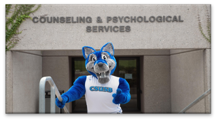  Blue coyote mascot outside the counseling and psychological services, representing encouragement and mental wellness support.