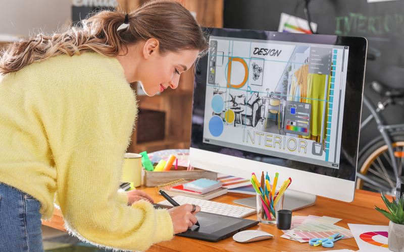 Graphic designer providing design support for a client
