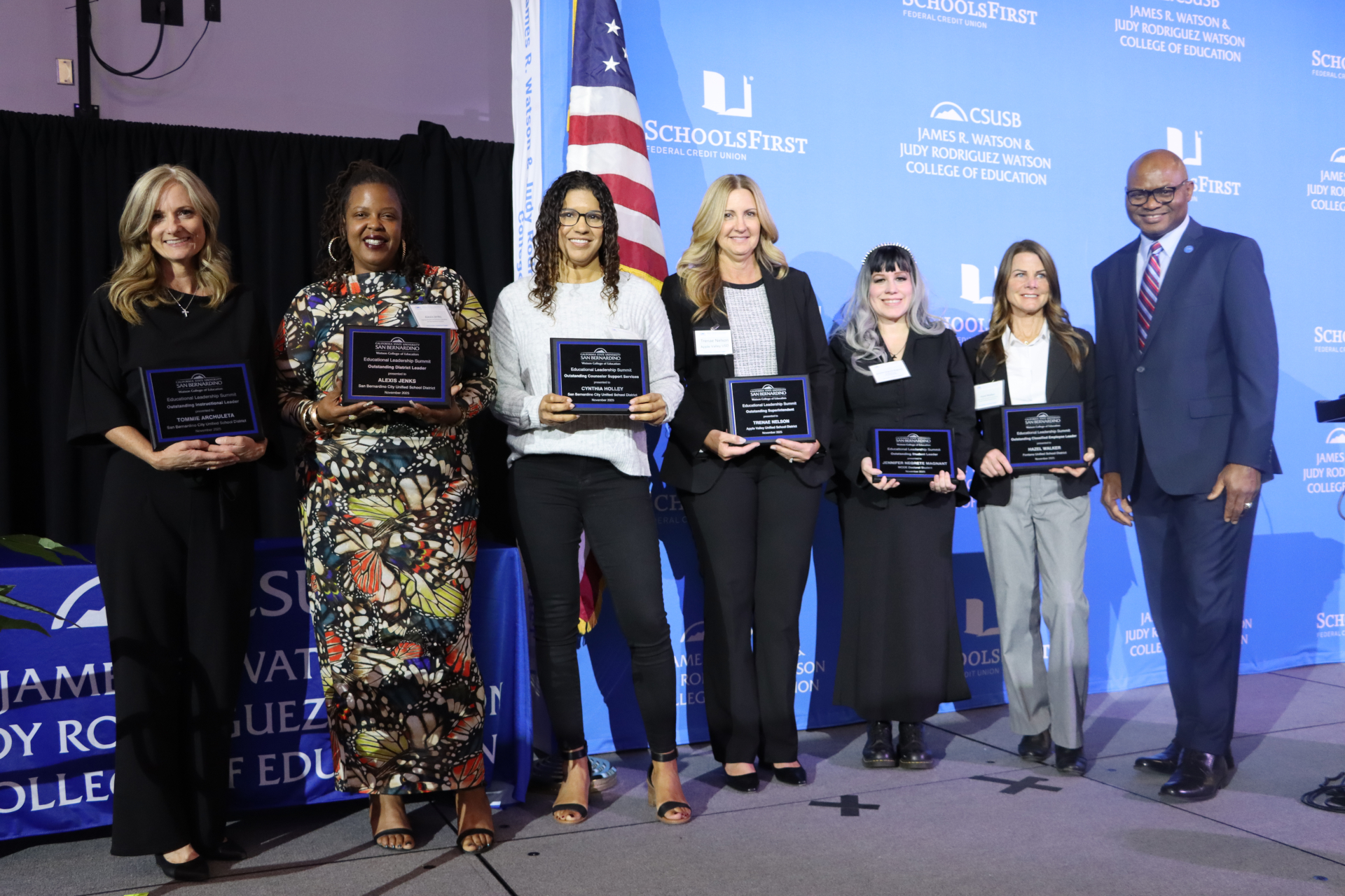 Photo of outstanding individuals are their awards