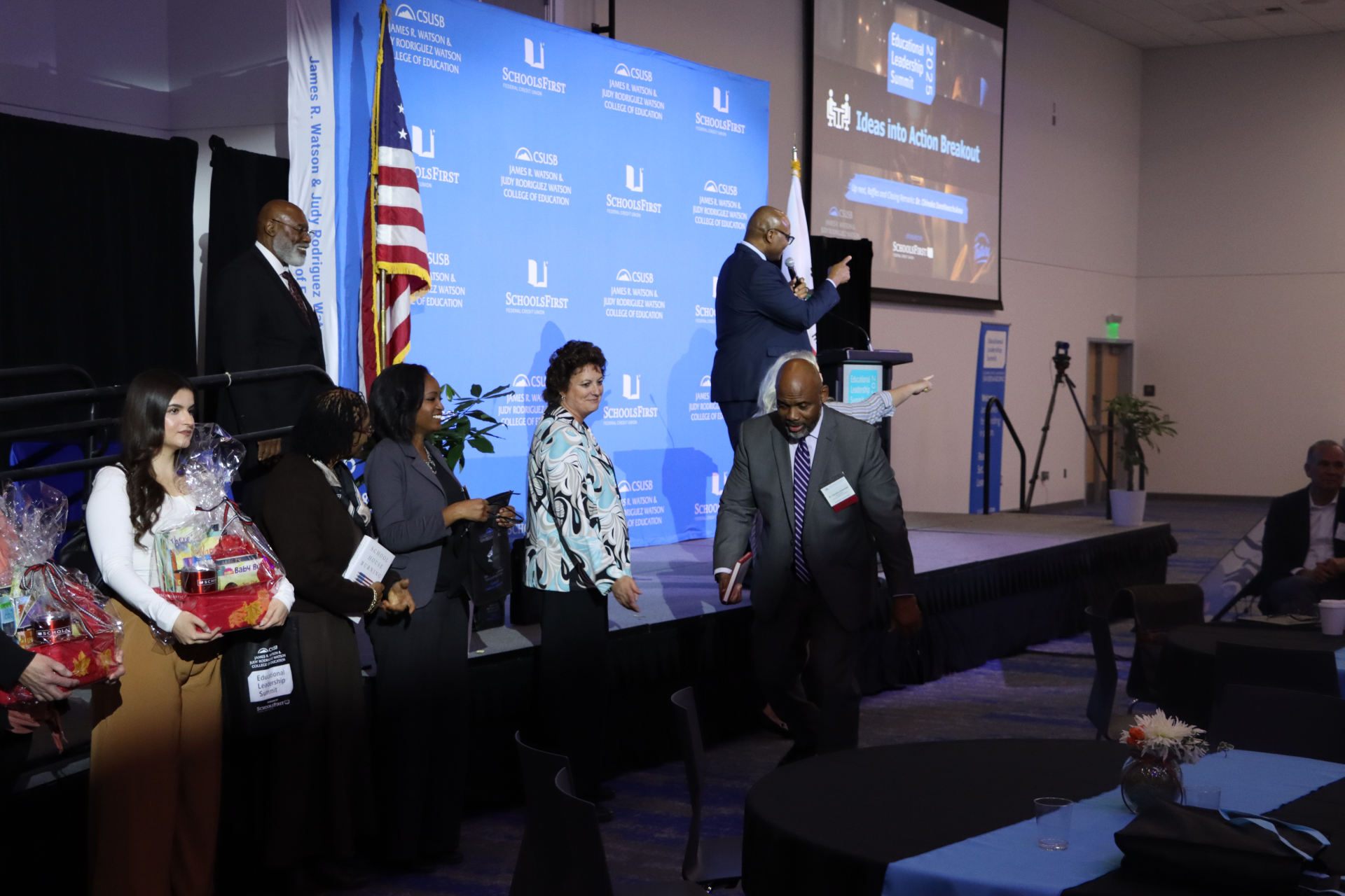 Photo of attendees winning things from the raffle