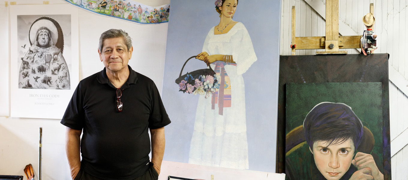 Ignacio Gómez and some of his paintings