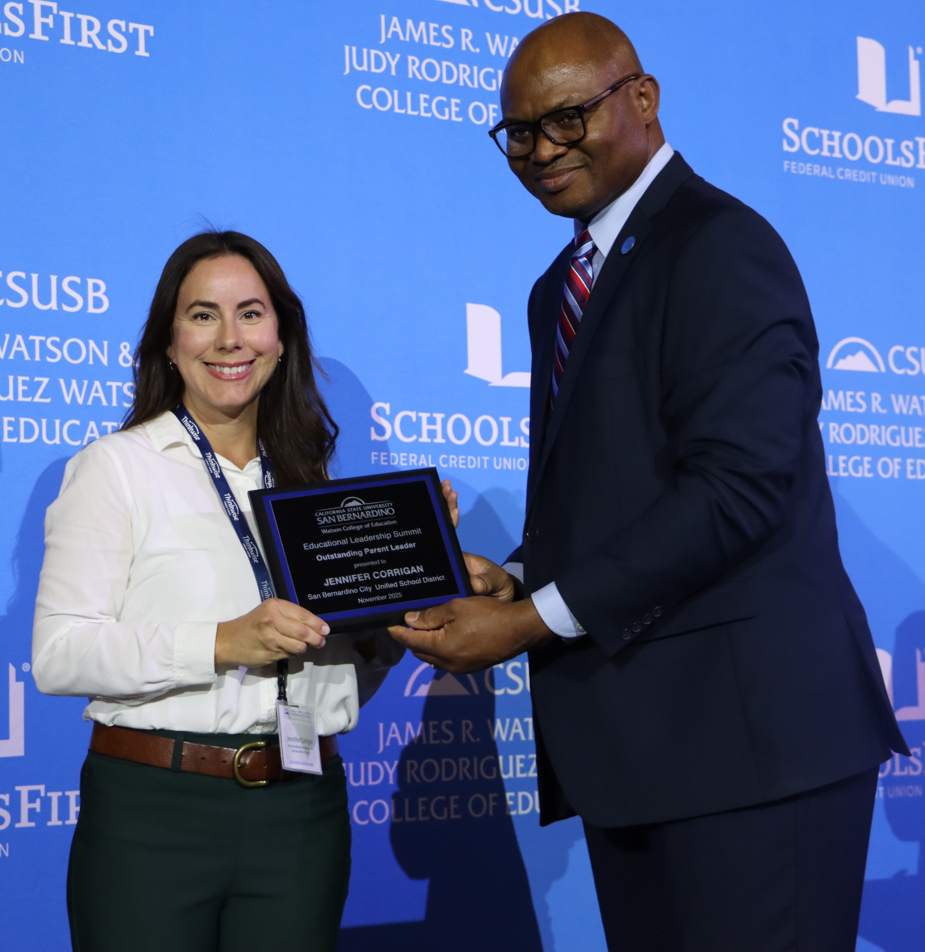 Photo of Jennifer Corrigan receiving an award