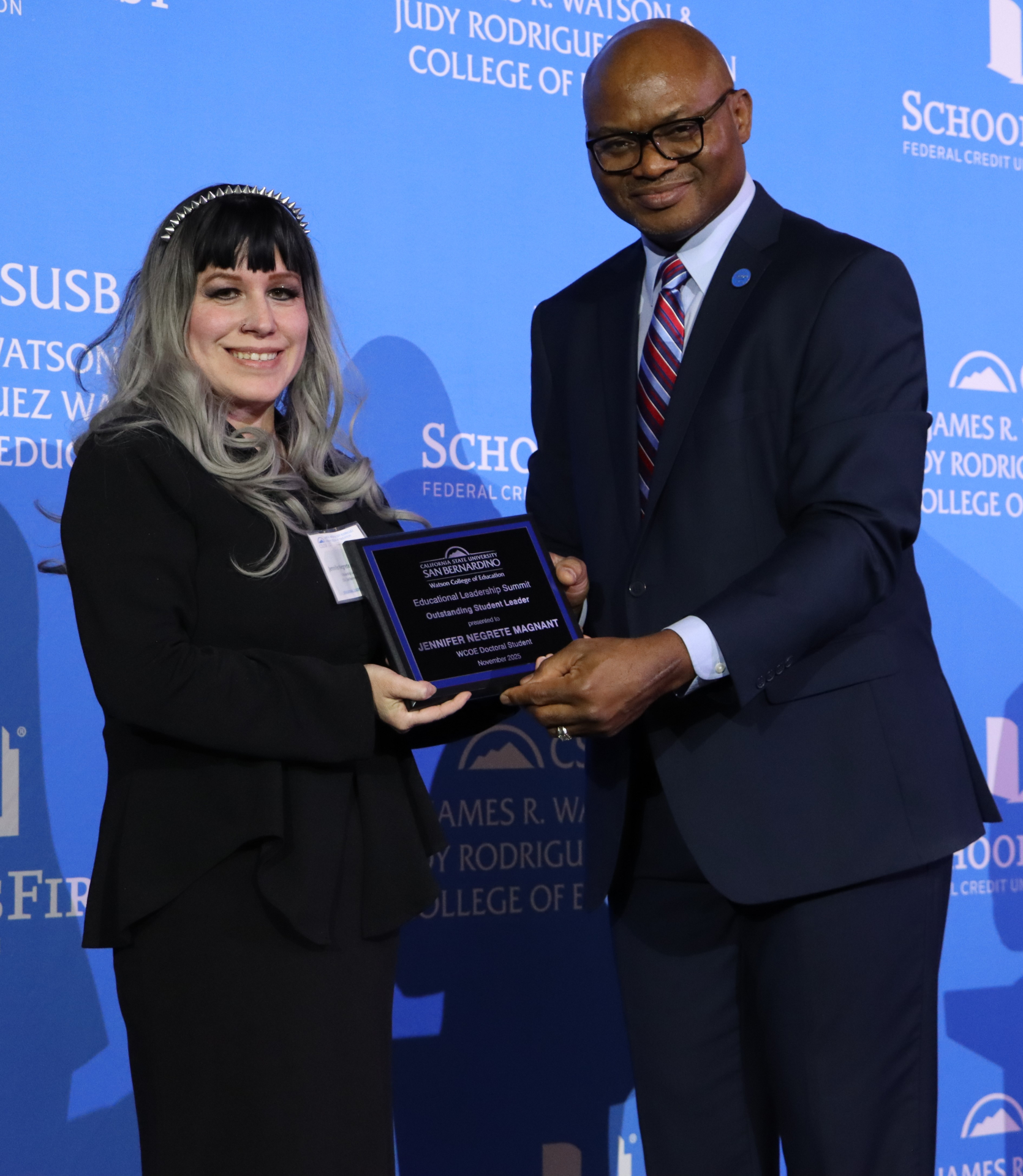 Photo of Jennifer Magnant receiving an award