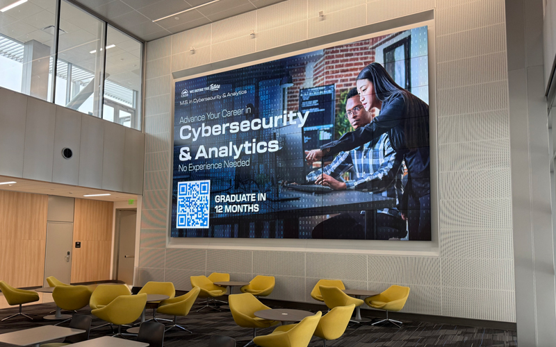 CGI Media wall event area with branded adversiting showing on the board