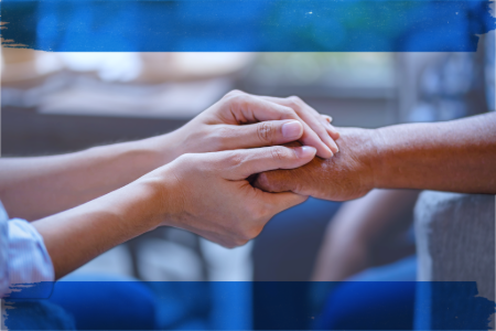Two people holding hands to symbolize a resource with a focus on handling crises.