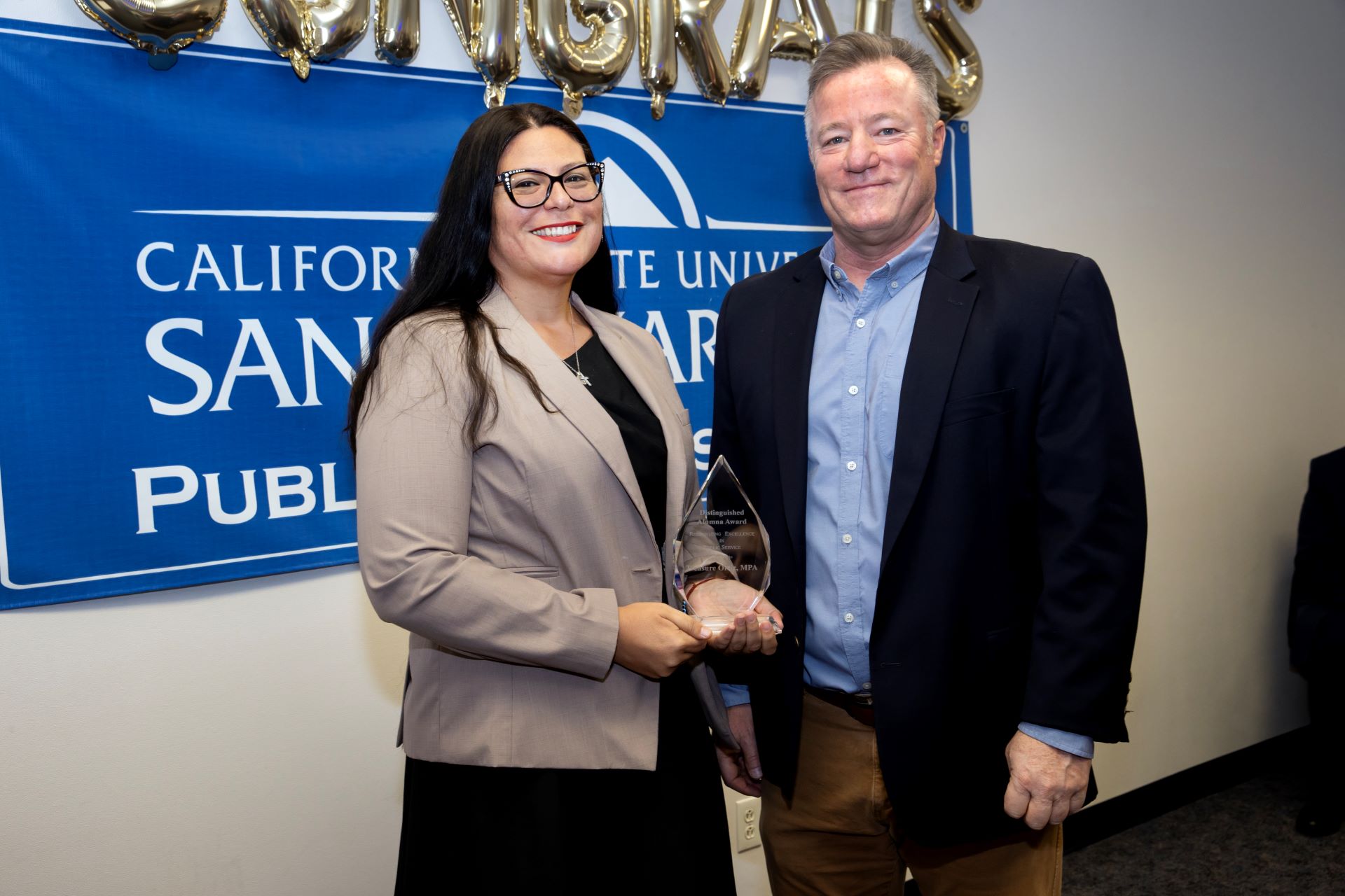 Dr. Treasure Ortiz received the CSUSB MPA Distinguished Alumna Award. 
