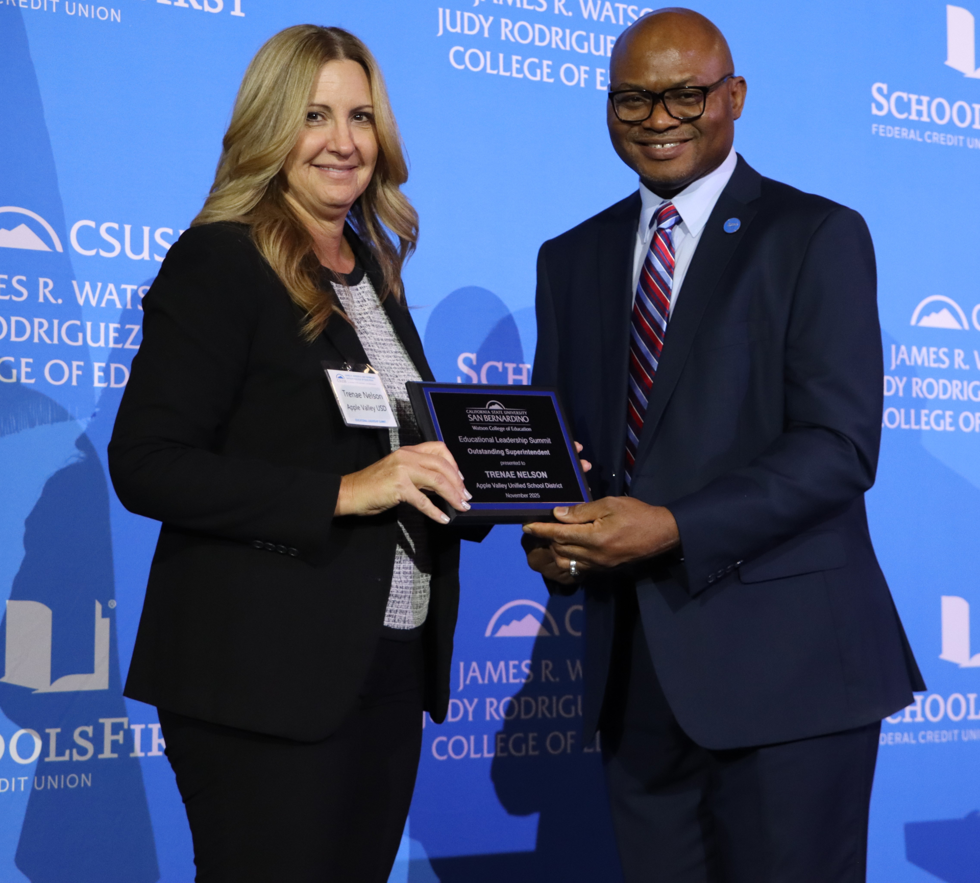 Photo of Trenae Nelson receiving an award