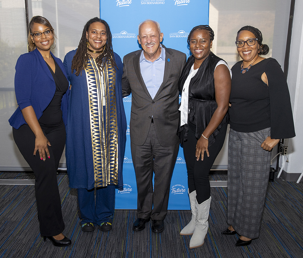CSUSB President Tomás D. Morales (middle) congratulated event honorees (from left) Reneisha Wilkes, EOP Renaissance Scholars Program coordinator; Kristi Papailler, professor of theatre arts; Annika Anderson, professor of sociology; and Nicole Henley, professor of health science and human ecology.