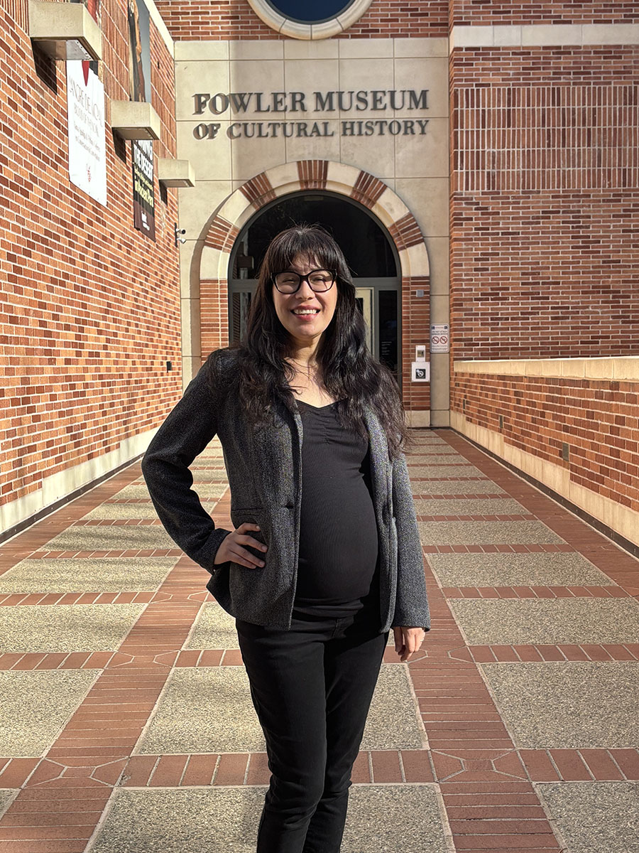 Daisy Ocampo Diaz at UCLA’s Fowler Museum of Cultural History, where an exhibit she helped curate, “Fire Kinship: Southern California Native Ecology and Art,” is on display through July 13. Assisting her were CSUSB history graduate student research assistant Lina Tejeda (Pomo) and Michael Chavez (Gabrieleno-Tongva), former Fowler Museum archaeological collections manager and CSUSB NAGPRA program manager.