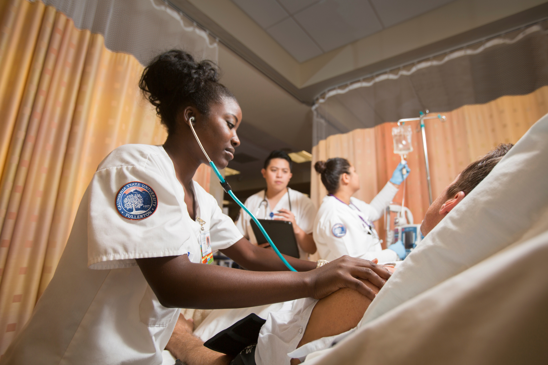 Medical professions attending to a patient