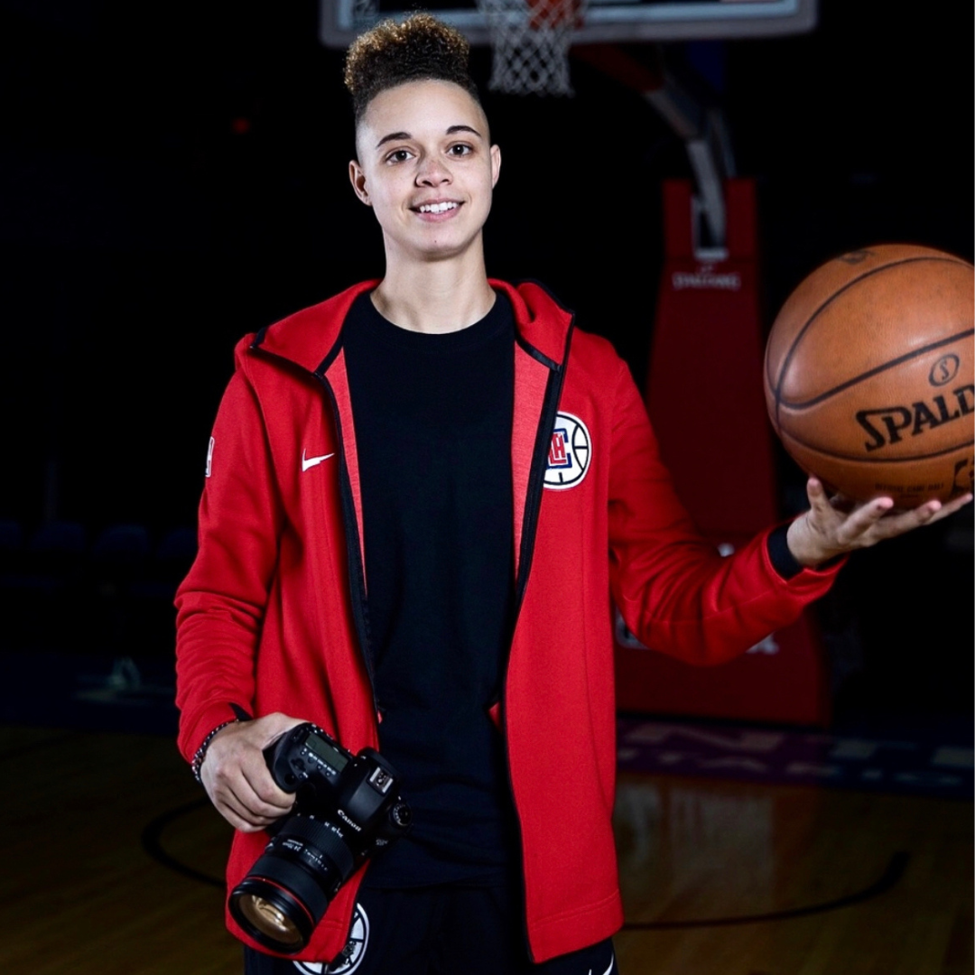 woman holding basketball