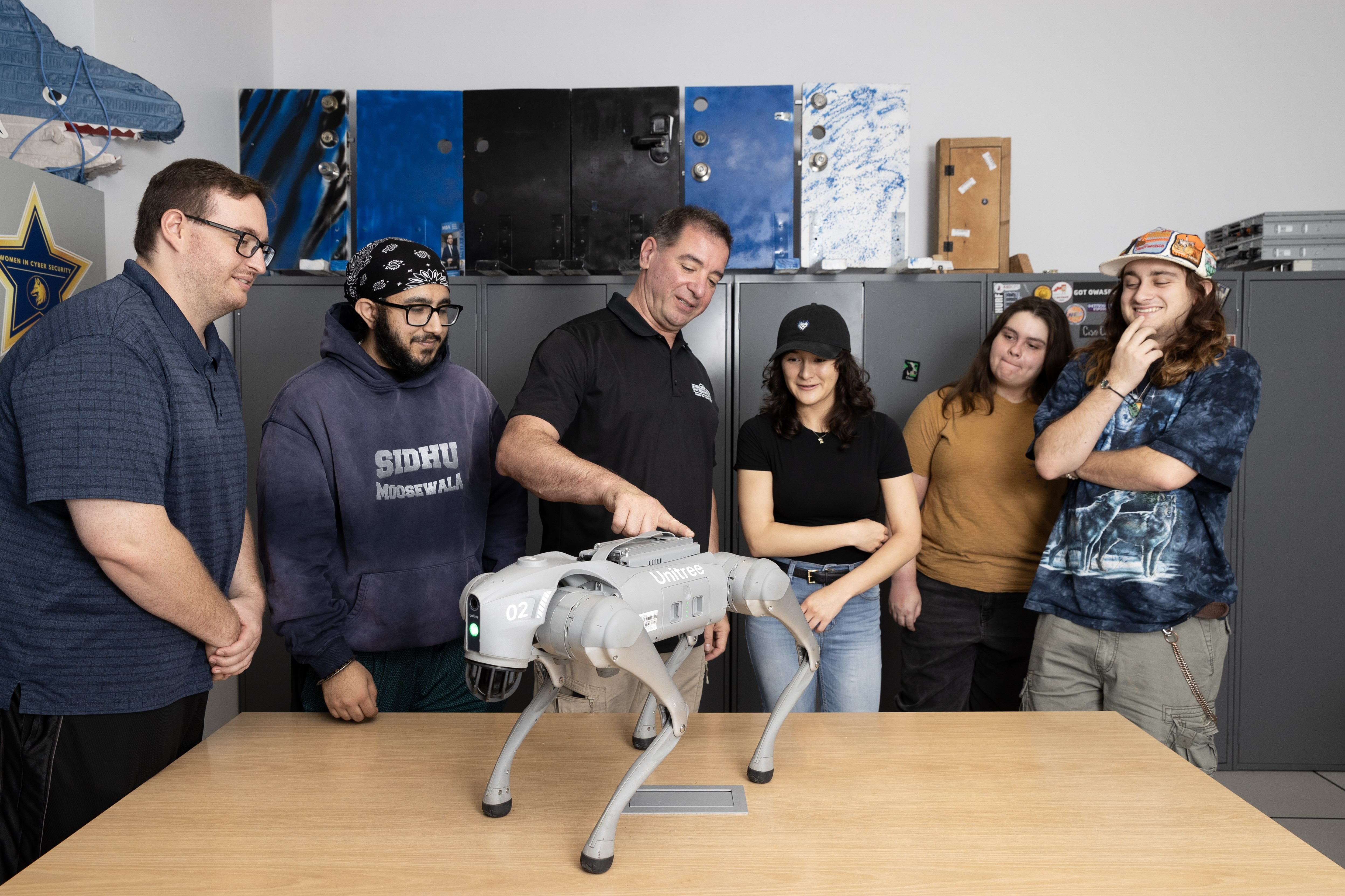 Professor with a robot dog