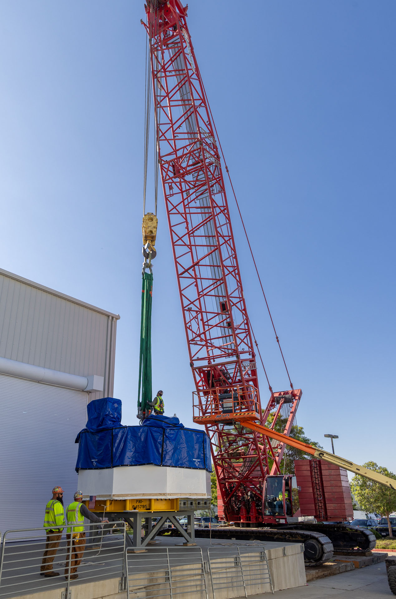 Workers at General Atomics in San Diego prepare the Central Soleniod Module for transport.