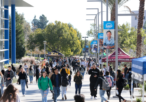 Students walking through Coyote Walk