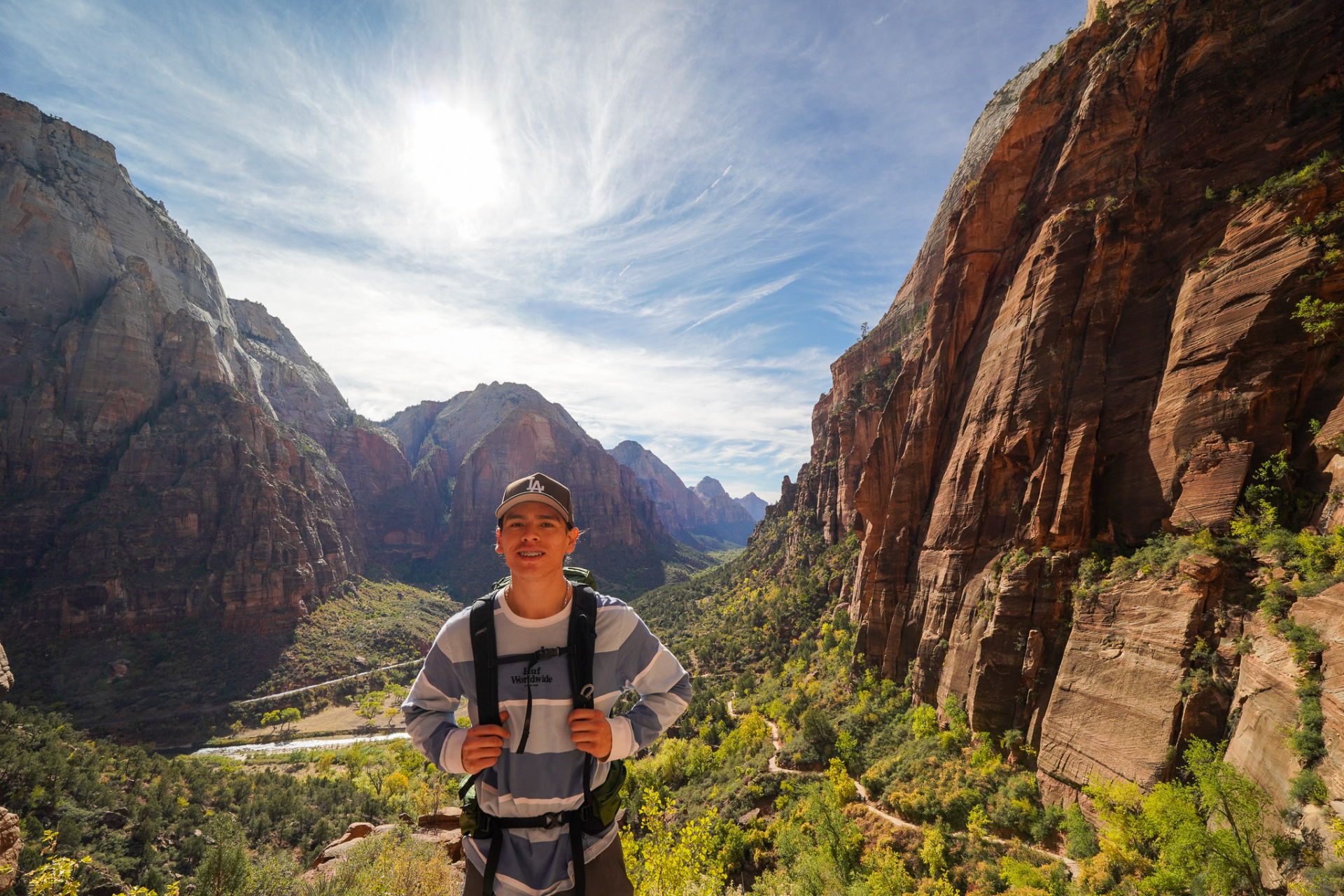 man with canyon in background