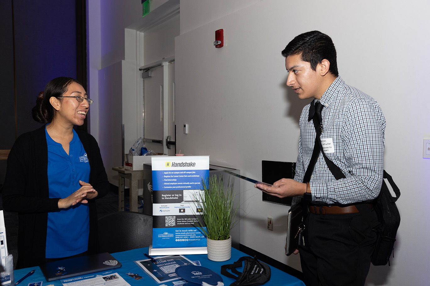 Faculty talking with student