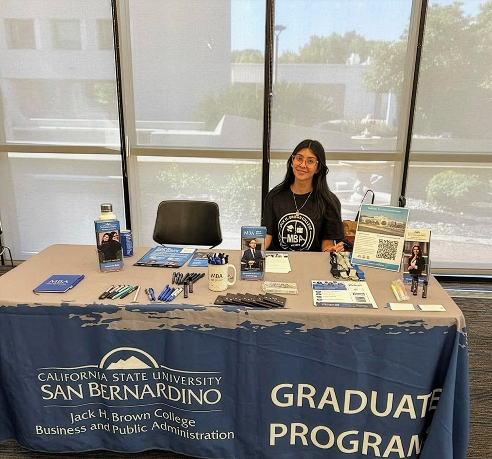 Student at a Graduate Program booth