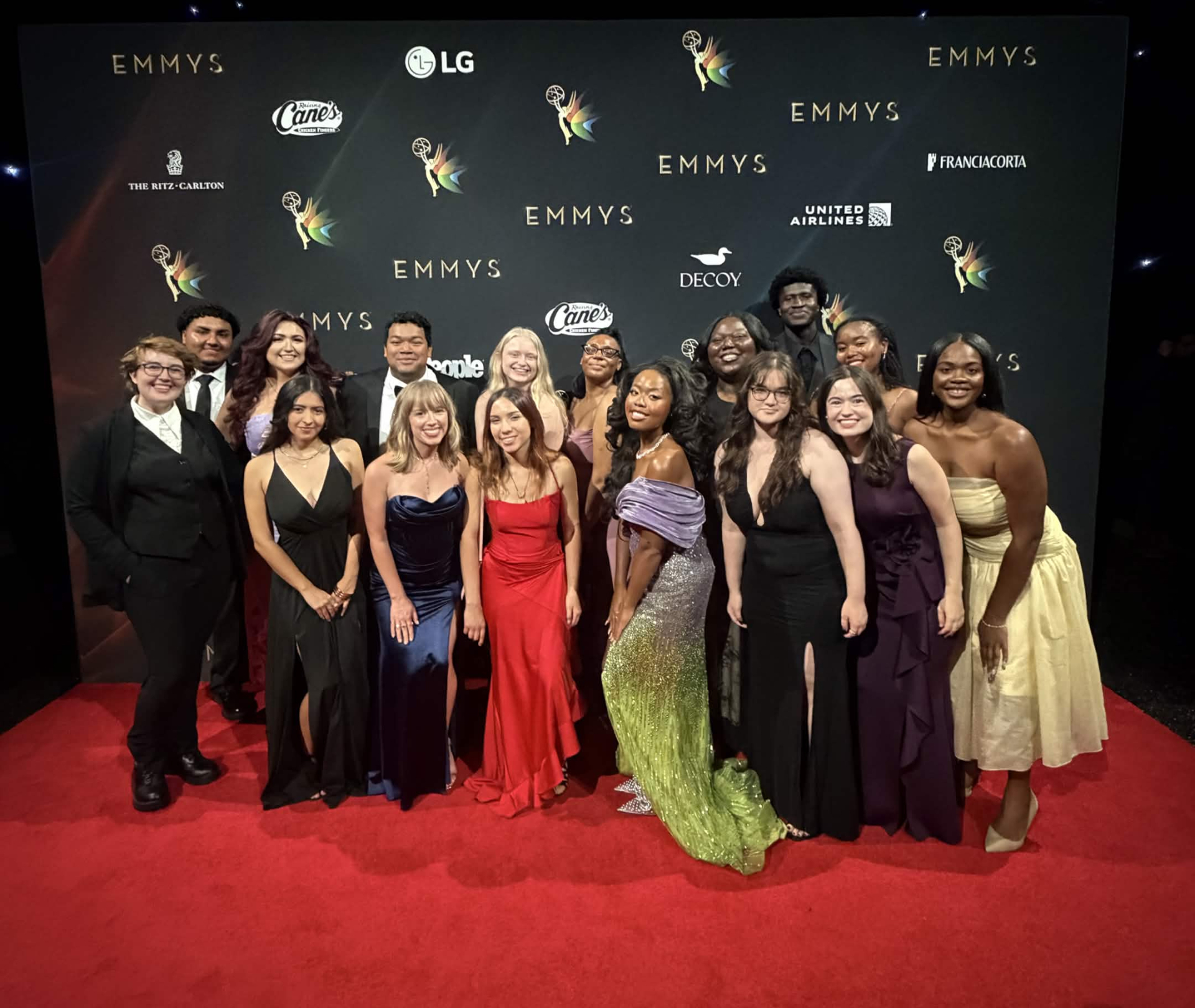 Webb, in back row at center, poses with her fellow interns at the Creative Arts Emmy Awards.