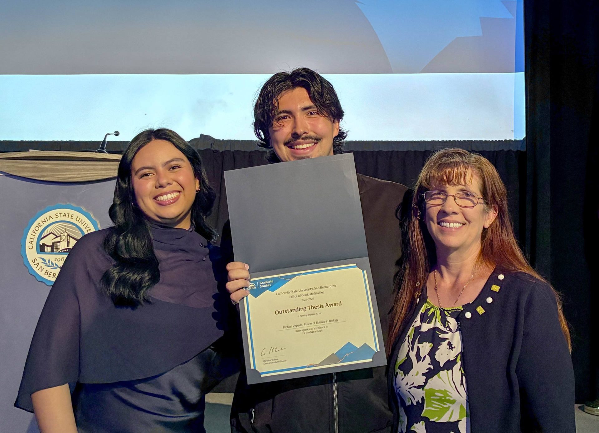 Outstanding Thesis Awardee Michael Zepeda and family.