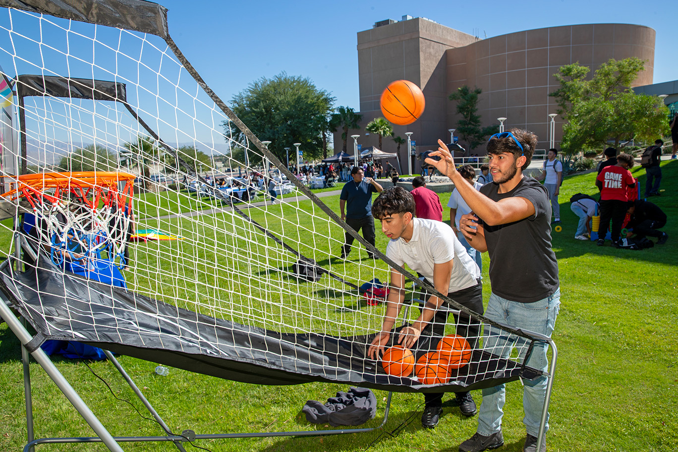 Students playing basketball