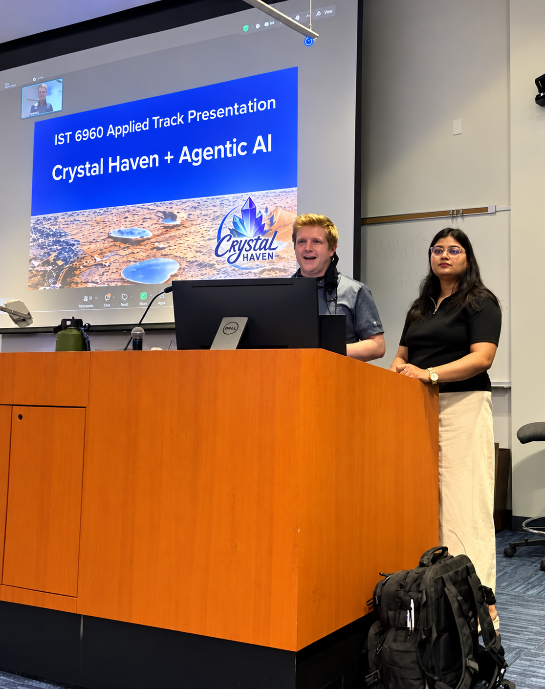 Tanu Gupta, at right, gives a cybersecurity presentation for one of her classes.