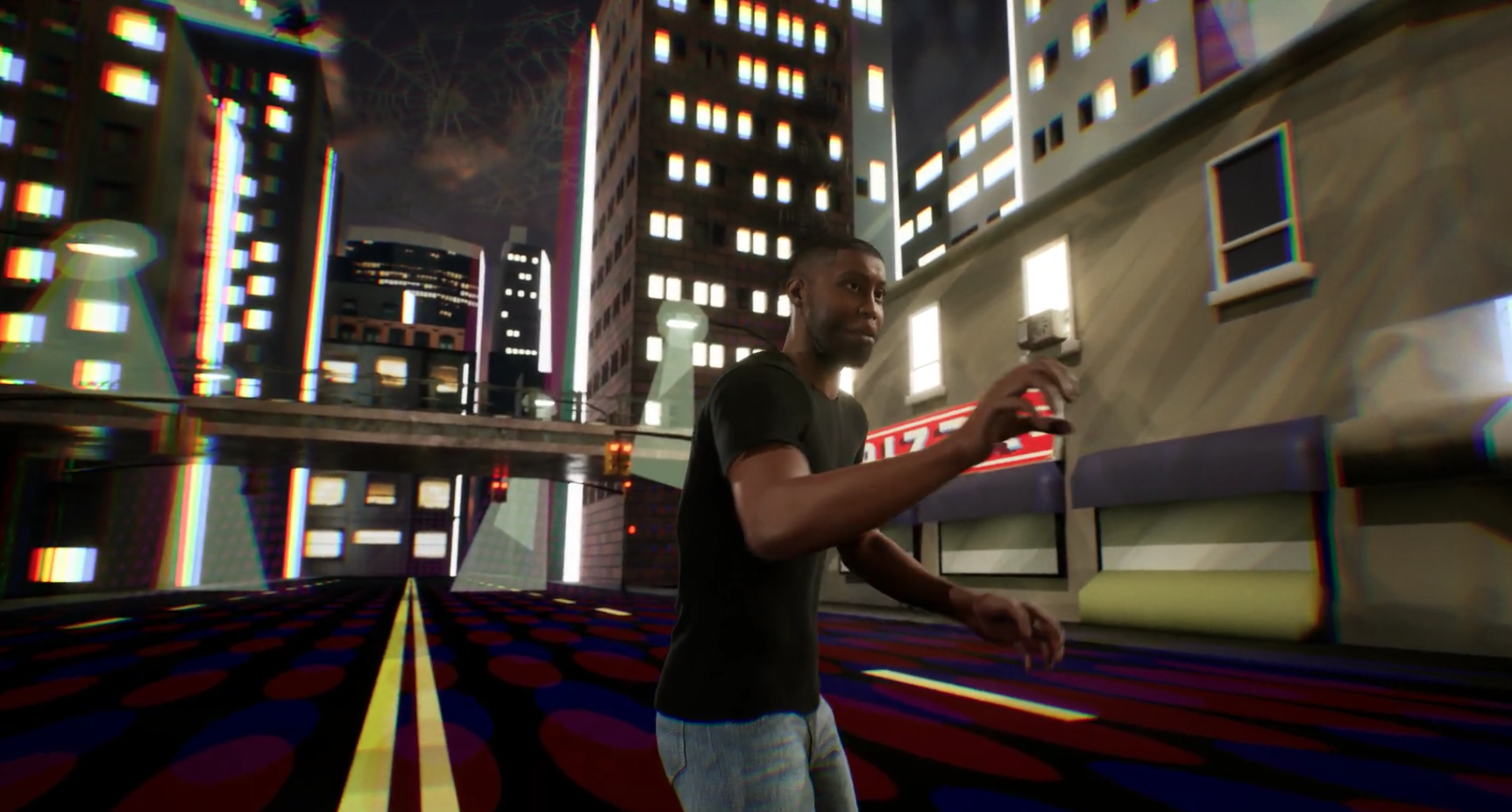 A stylized 3D-rendered scene shows a man in a black T-shirt and jeans walking through a city street at night. Tall buildings with glowing windows surround him, and the environment has a colorful, slightly distorted visual effect. The road beneath him features bold red and blue patterns, and he appears to be mid-step with one hand raised as if interacting with something or moving cautiously.