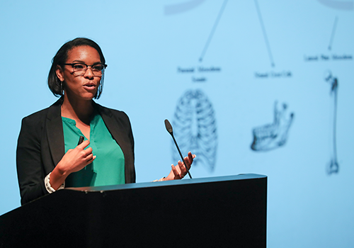 Picture of Alumni Nicole Sparks giving a lecture