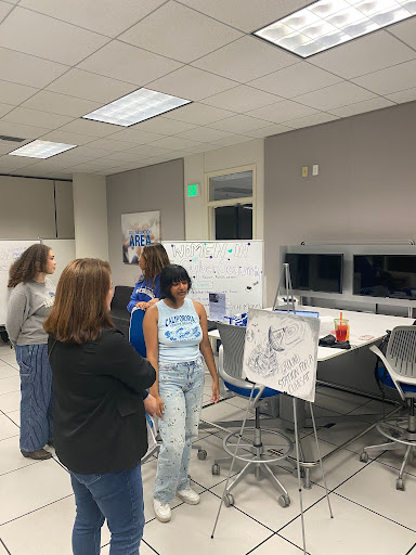 Vaishali sharing her CubeSat project during the Open House event to new students.
