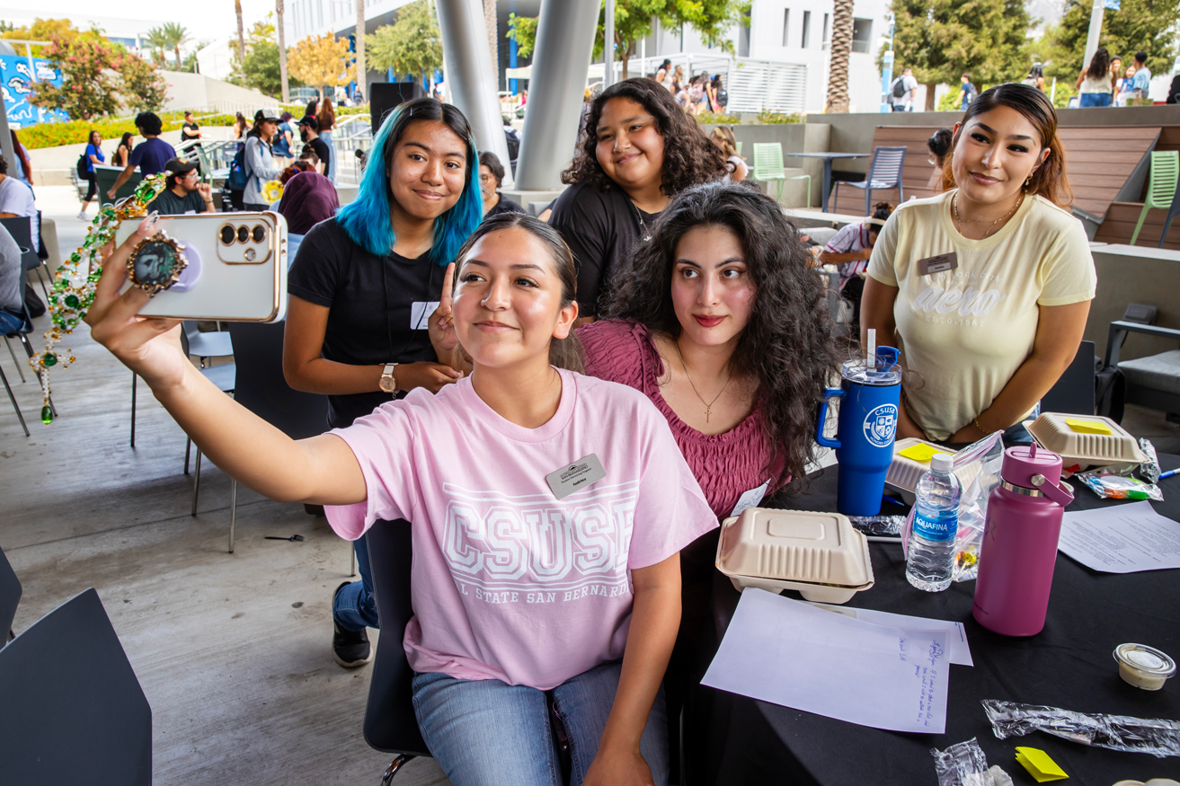 CSUSB students pose for a selfie at the Coyote Experience Kickoff.