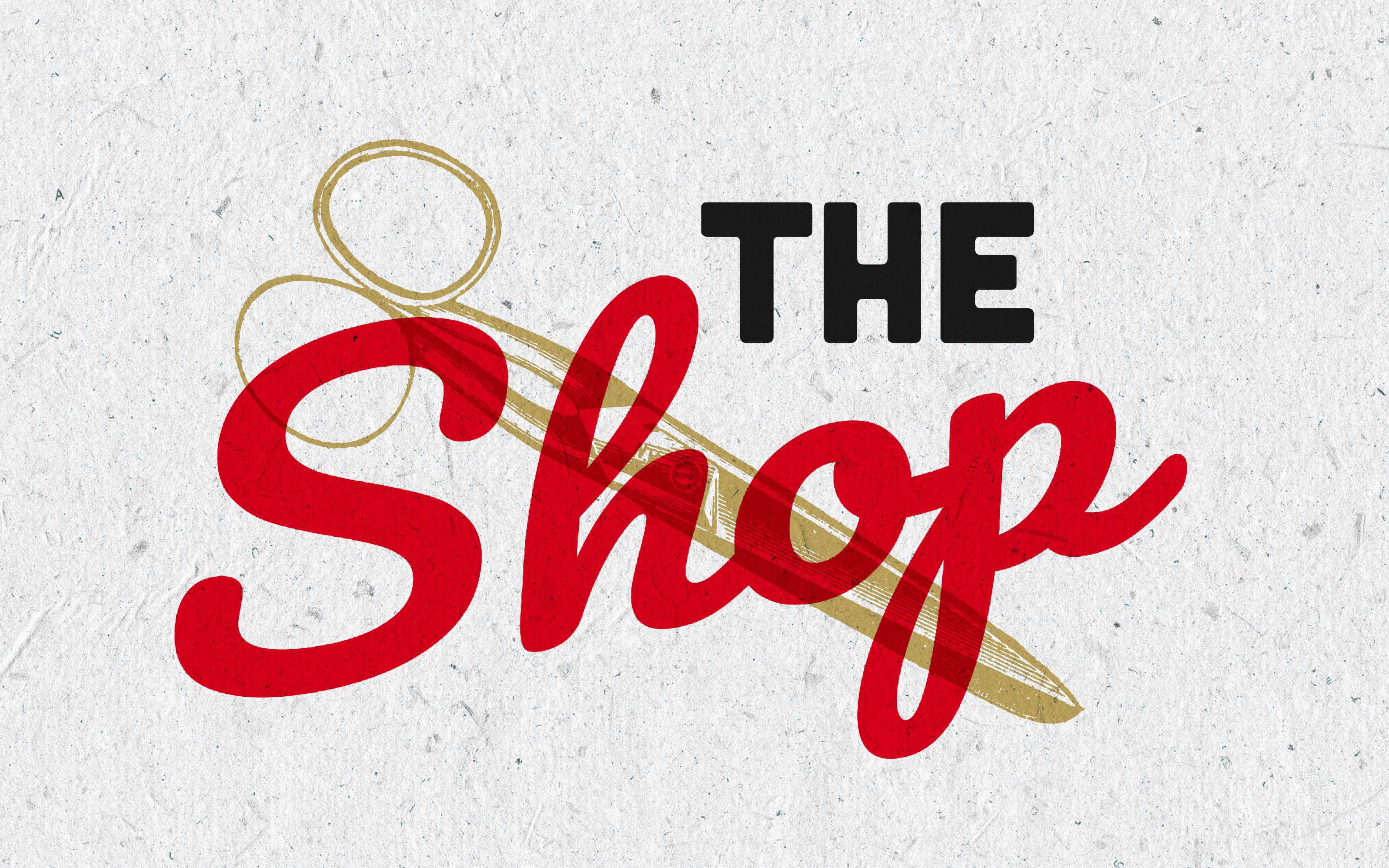 Graphic with a white background with the title "The Shop", the word shop in a bold red with gold scissors across.
