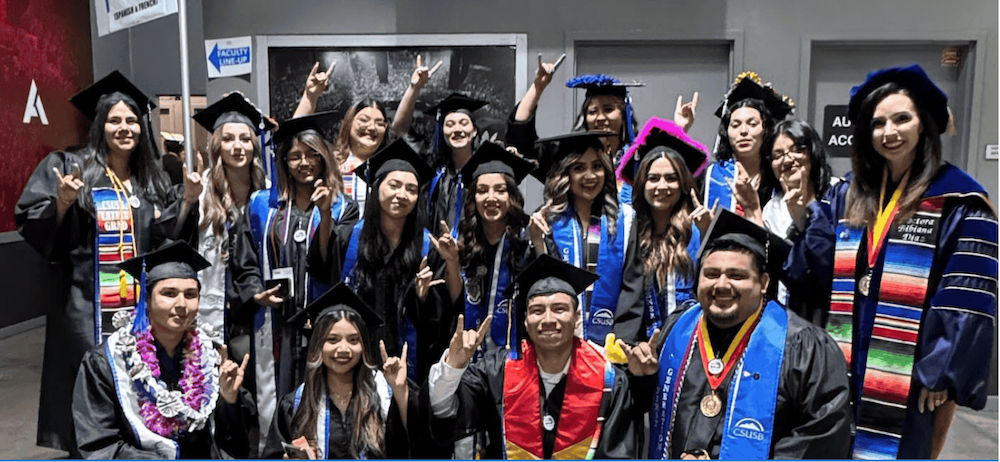 Graduating Spanish Masters students in their regalia