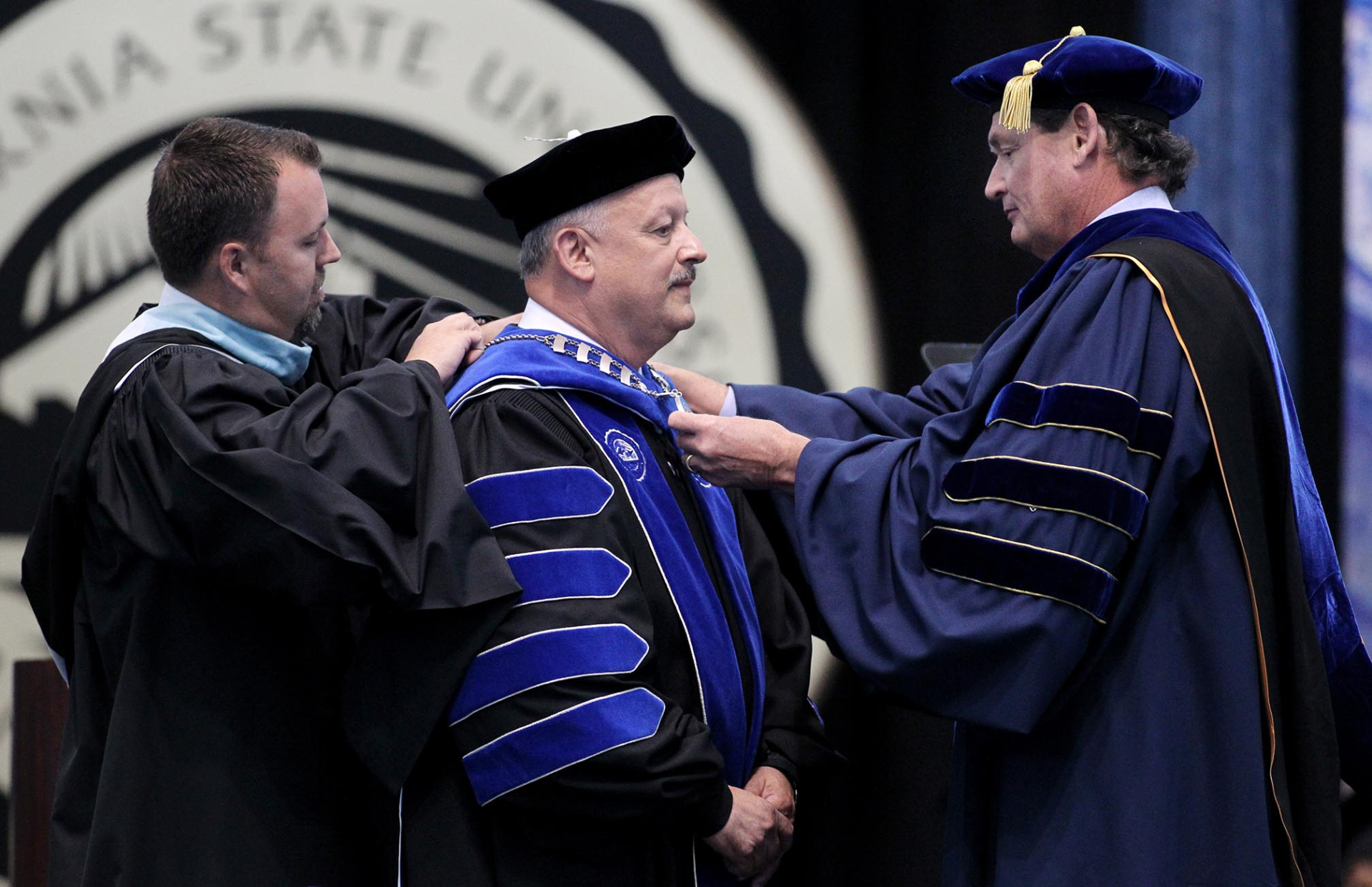 Tomás D. Morales (center) was named the university’s fourth president.