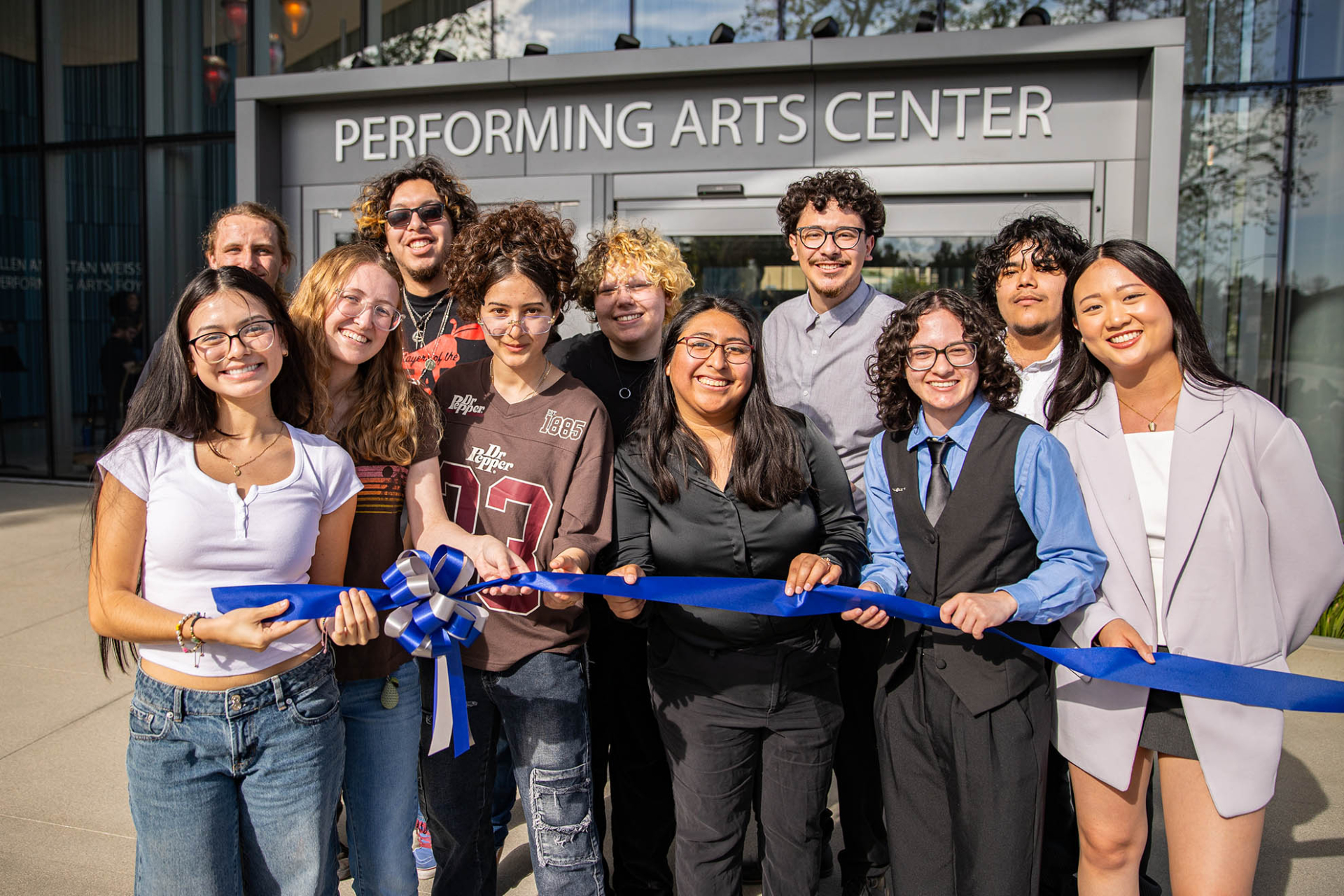 Performing arts students celebrate at the ribbon-cutting celebration for the long-awaited, state-of-the-art Performing Arts Center. 