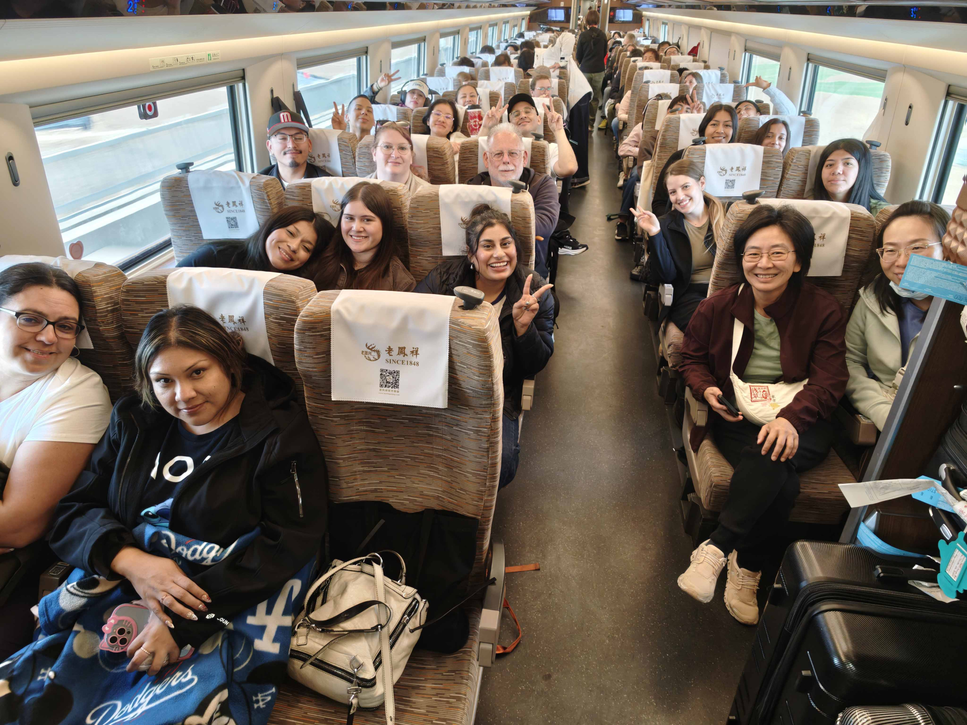 Students ride China’s high-speed rail at speeds up to 347 km/h, experiencing cutting-edge engineering and the convenience of ordering snacks and meals delivered directly to their seats.