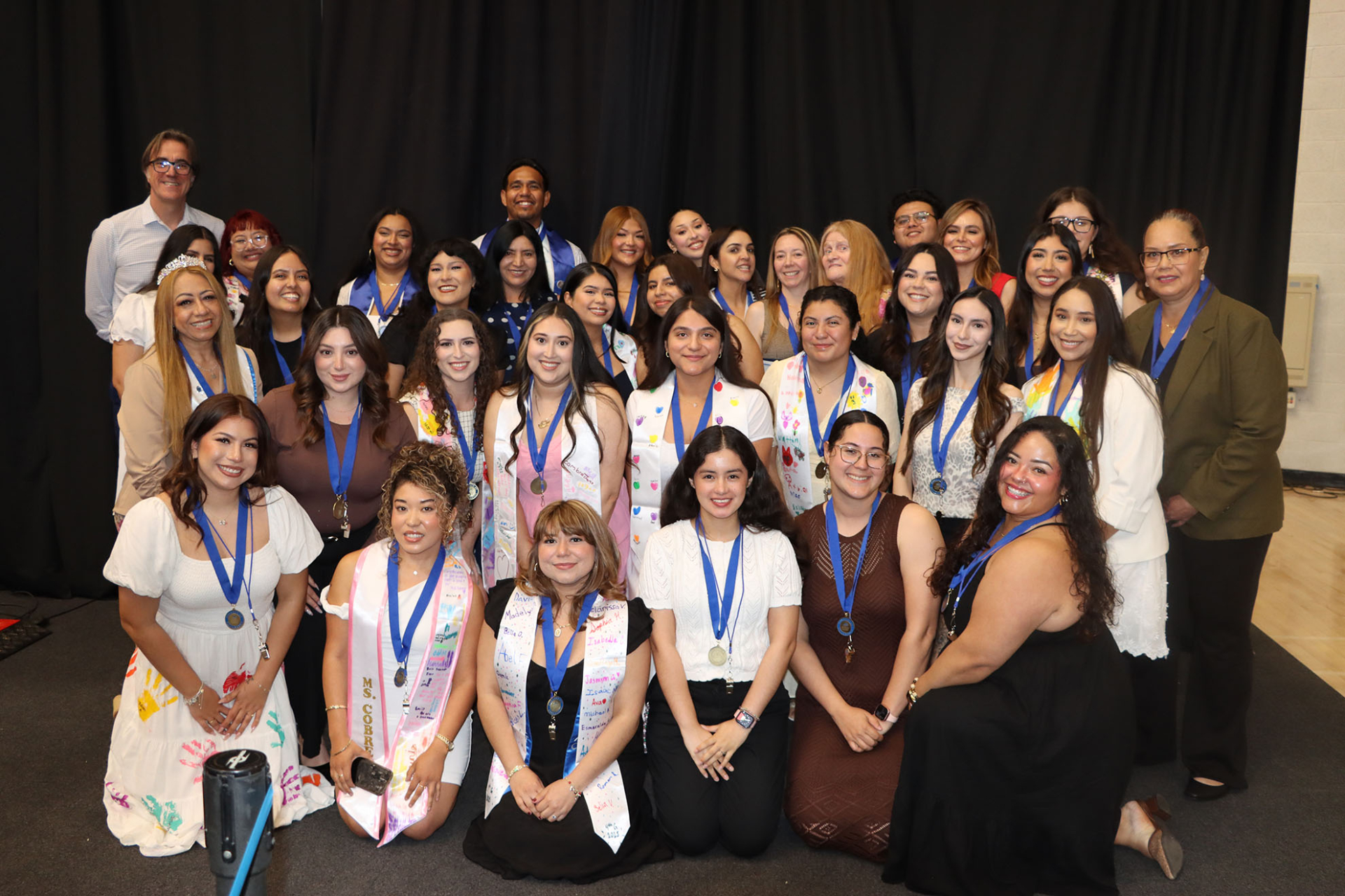 CSUSB bilingual teacher candidates pose at the 2026 James R. Watson and Judy Rodriguez Watson College of Education Credential Ceremony.