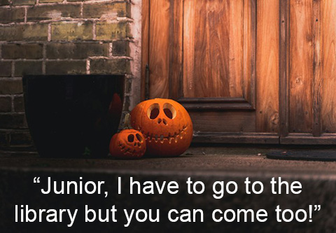 “Junior, I have to go to the library but you can come too!” Two jack o’lantern pumpkins, one large, one small, sit on a doorstep.