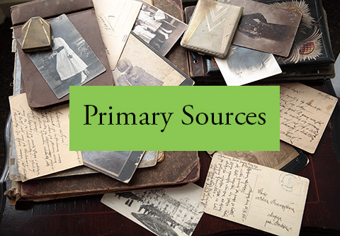 Primary Sources.  A small pile of historic photos, documents.