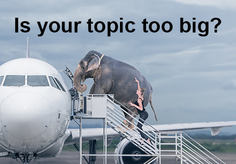 Is your topic too big?  A woman tries to load an elephant into a jet plane.