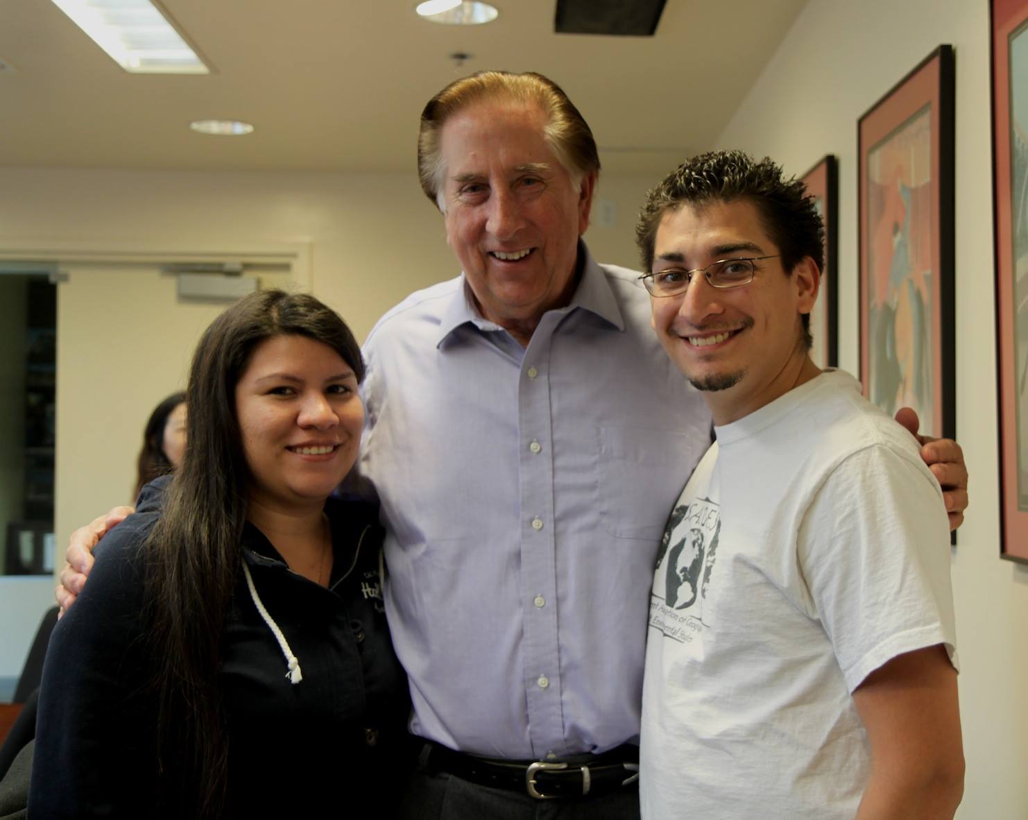 Three people standing for photo