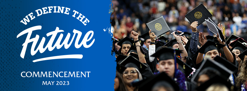 Graduating Students holding their diploma cover.