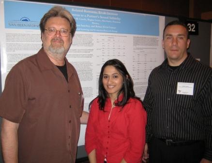 Cramer with students at poster (Tanner)