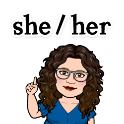 Animated image of a Mexican woman with curly brown hair and glasses pointing up at the pronouns "she/her" written above her head.