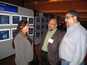 Michael David and student at her poster