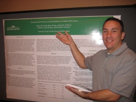 Man gesturing at board