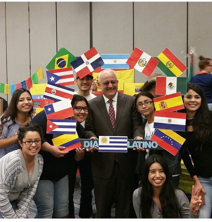 President Morales poses with club members