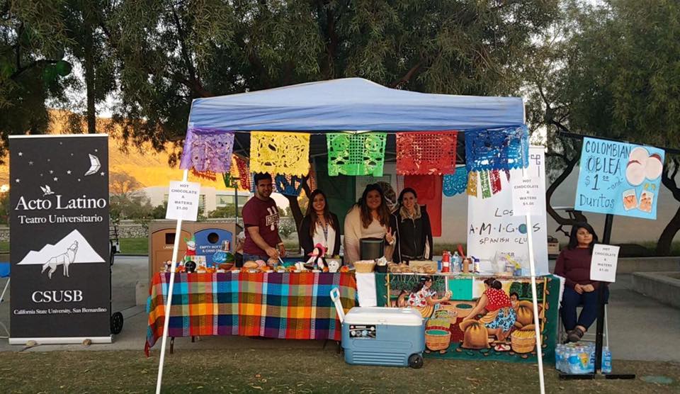 Students at club table for market night