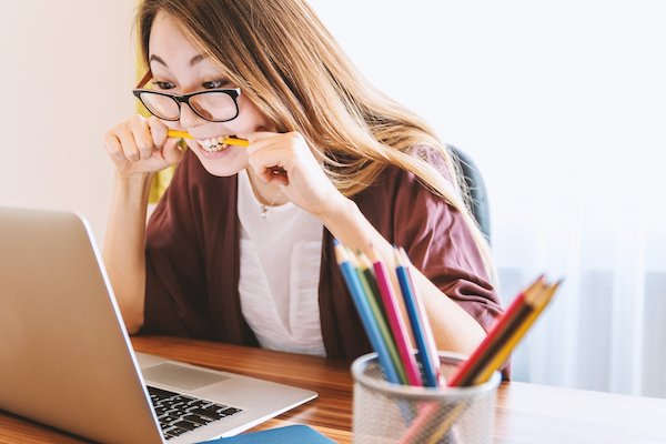 Woman taking test on a computer