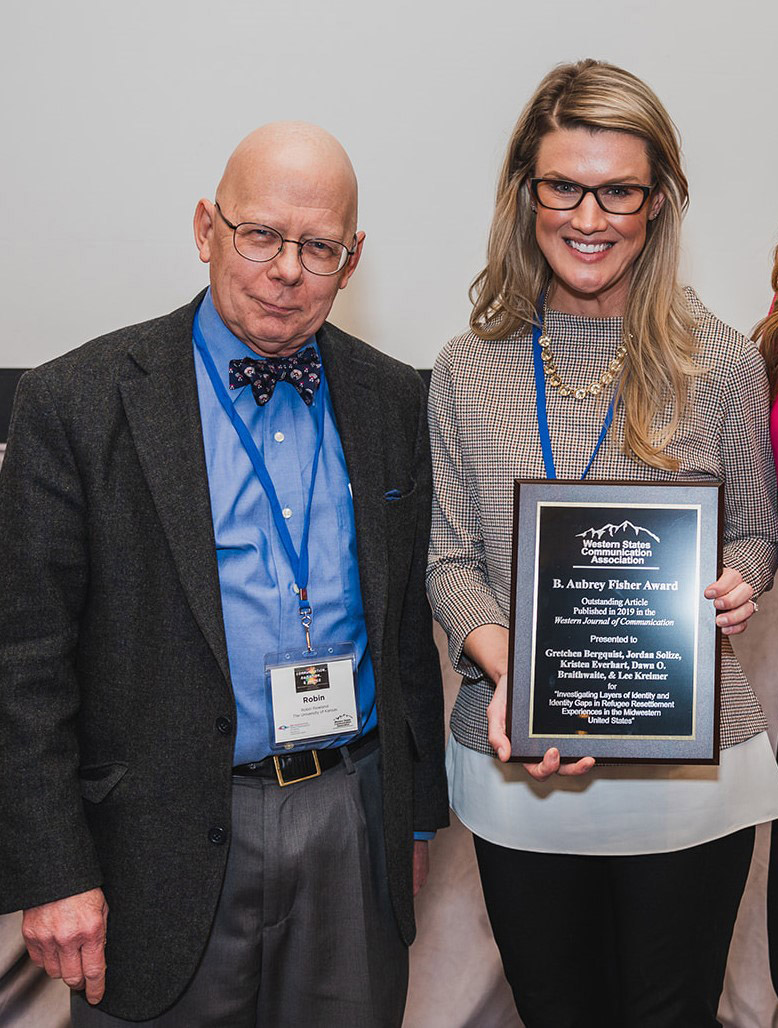 From left, Fisher Award Committee Chair Robin Rowland with Gretchen Bergquist CSUSB