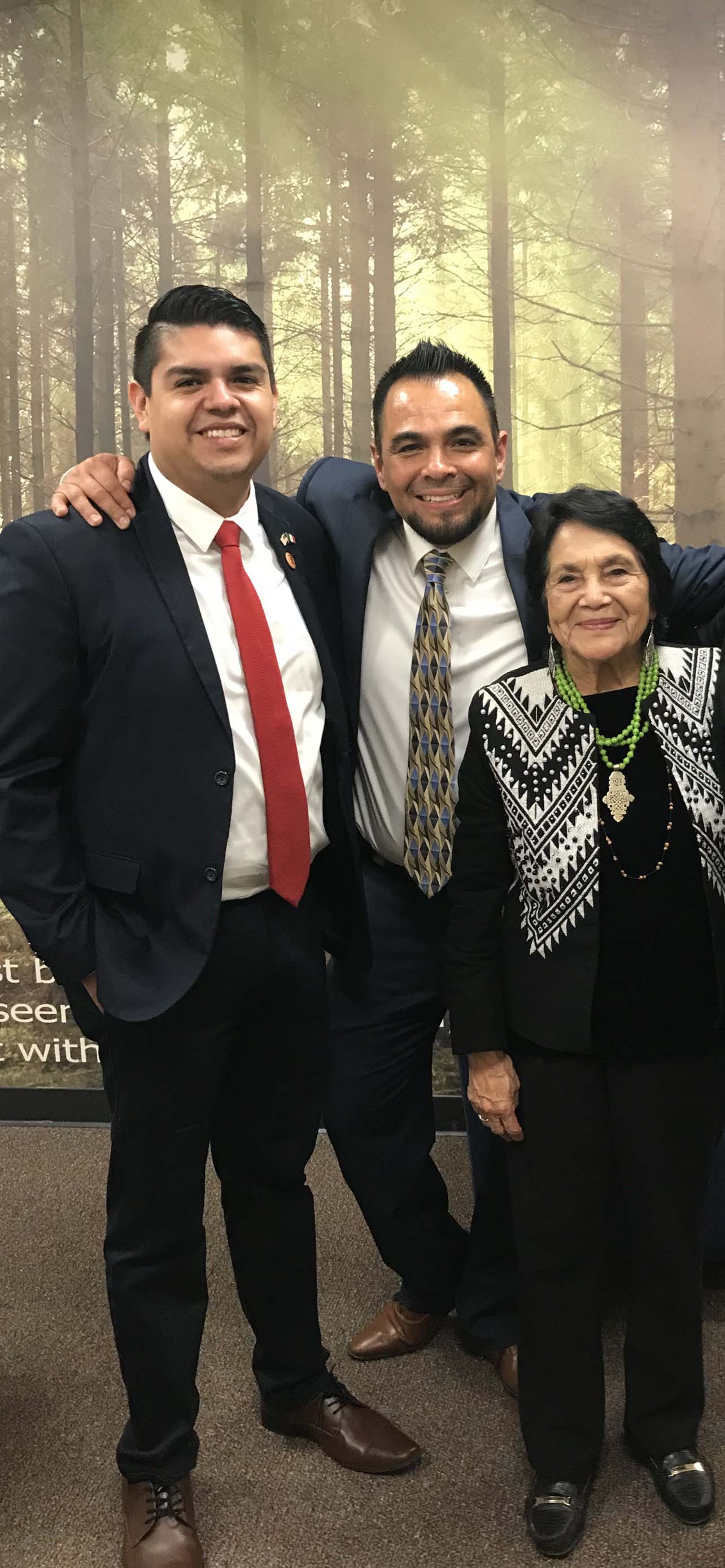 From left: Alfredo Barcenas  and Jesse Felix with Dolores Huerta, civil rights activist and co-founder of the United Farmworkers Union.