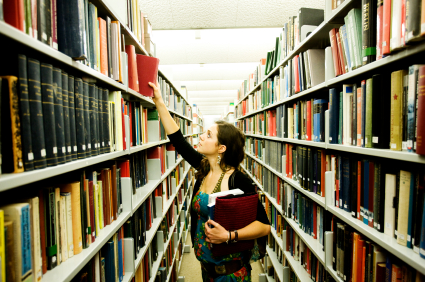 Girl looking at books